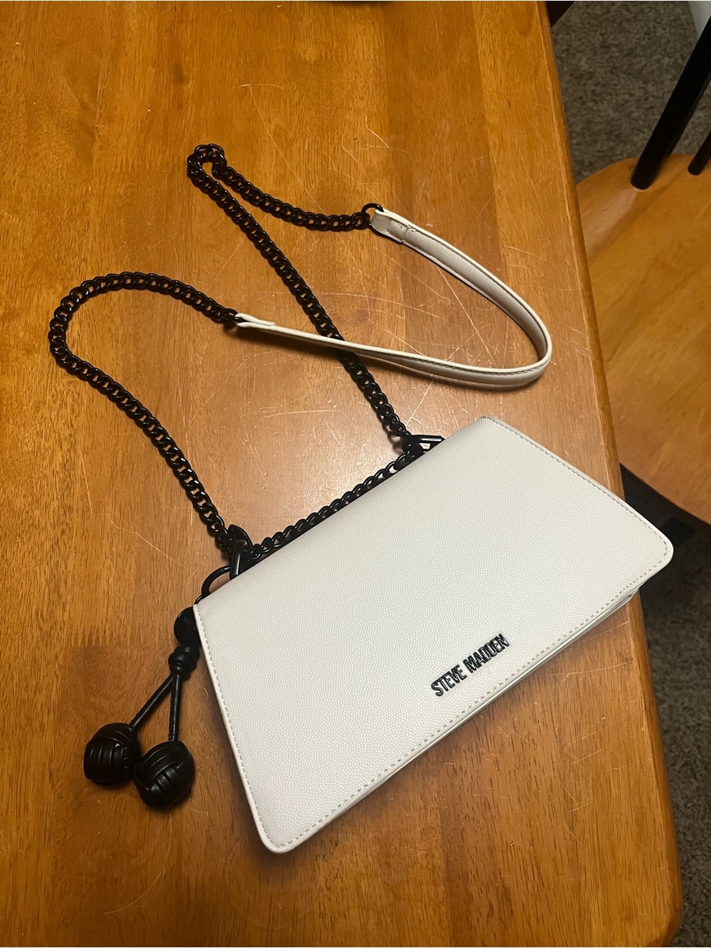 Steve Madden White Crossbody with Black Chain Strap and Tassel Accents